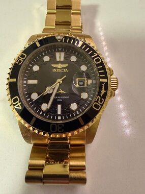 Invicta Gold Tone Watch with Black Dial